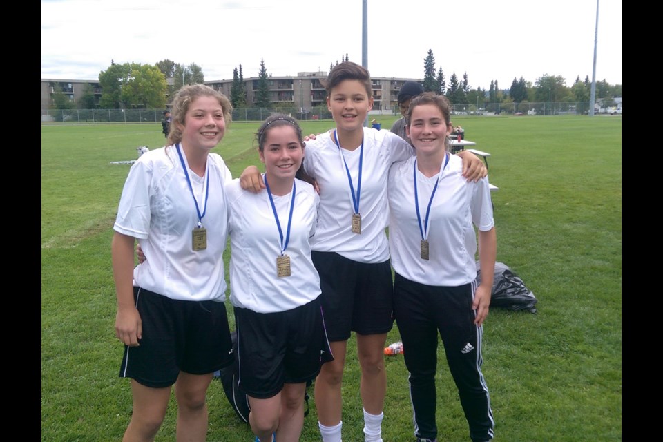 The Lower Mainland girls team won the under-15 B.C. Aboriginal soccer title last week in Prince George. The squad included four New Westminster players among the starting lineup: from left, Taylor Spong, Sydney Fowler, Shianne Lowka and Madison Fowler.