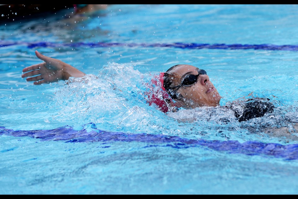 Burnaby Barracudas' Alessia Marquez closes in on the deck during her 100m backstroke heat at last month's provincial summer swimming championships in Coquitlam.