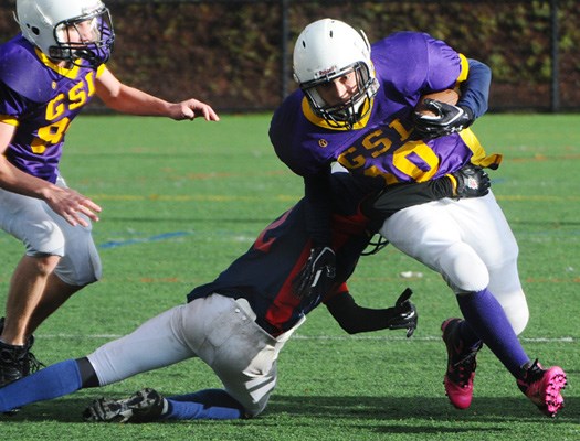 GSL football action between the Hawks (in blue) and the Vikings (in purple).