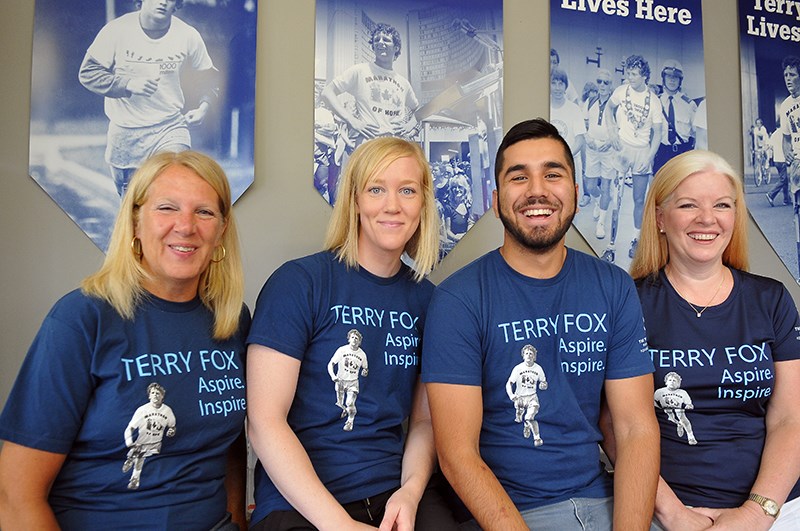 Florence Vandebeek (fundraising and office assistant), Kirsten Fox (school co-ordinator), Hamed Amiri (promotions assistant) and Donna White (provincial director) at the BC/Yukon branch of the Terry Fox Foundation, in Port Coquitlam, on Wednesday. The team is gearing up for the 36th annual Terry Fox Run on Sunday, Sept. 18. See page 3 for the first story in our three-part series in the lead-up to the annual fundraiser.