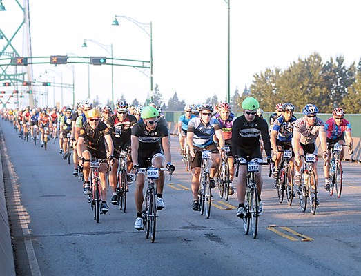 Over 7000 riders head across the Lions Gate Bridge in the RBC GranFondo Whistler.