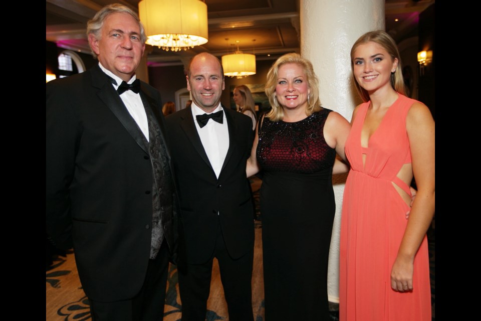 UVic International Business dean Saul Klein, left, Ed Newton, his wife Linda Hasenfratz, who received the UVic Distinguished Entrepreneur of the Year award at the Fairmont Empress on Monday, and their daughter Olivia Newton.