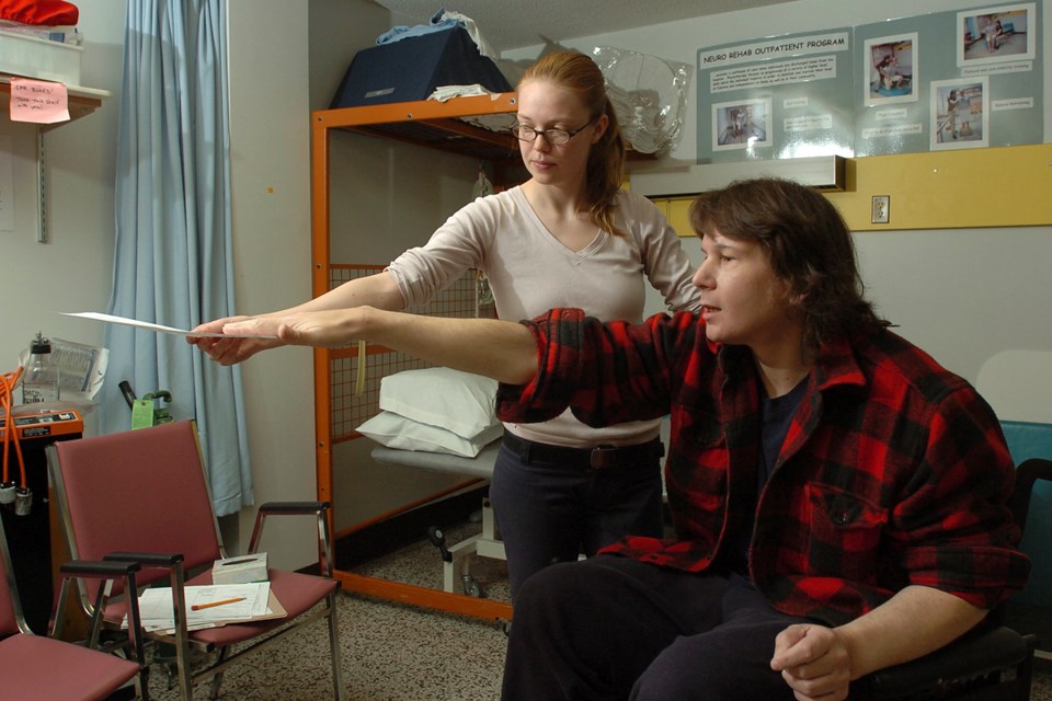 Lions Gate Hospital physiotherapist Marega Medlicott helps Potter regain his balance and coordinatio