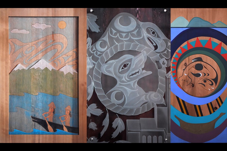 From left to right is the work of Jody Broomfield of Squamish Nation, Jordan Gallie of Tsleil-Waututh and Chrystal Sparrow of Musqueam, which now hangs at city hall. Photos Dan Toulgoet