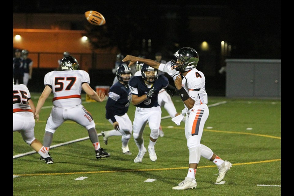New Westminster Hyacks’ quarterback Kinsale Philip, right, airs out a pass during last week’s lopsided 51-19 exhibition victory over G.W. Graham. The Hyacks launch the B.C. AAA senior football season on Friday, 7:30 p.m. at Mercer Stadium against Carson Graham. Pre-game festivities, including an alumni flag football game, begin at 4:30 p.m.