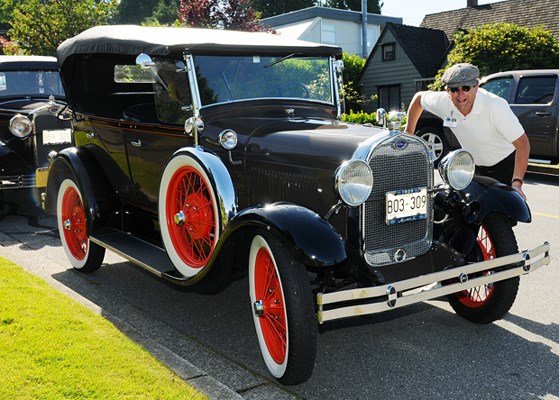 Stan Rothstein stands with his 1929 Model A Ford.
