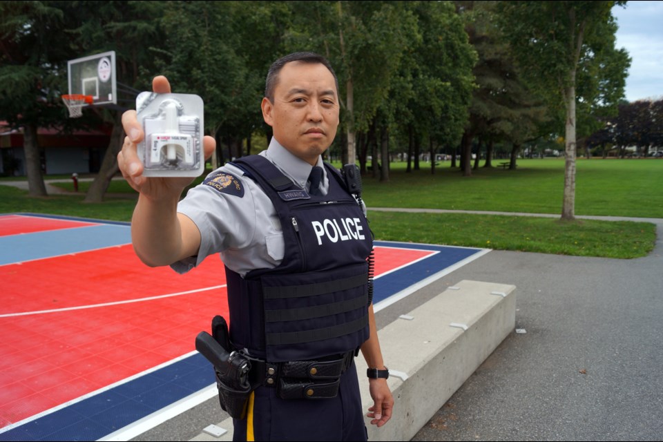 Cpl. Dennis Hwang, spokesman for the Richmond RCMP, says officers are carrying the naloxone kit to protect others, as well as themselves, since the deadly drug can be absorbed through the skin. Photo by Graeme Wood/Richmond News