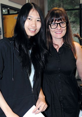 Winner Shu Chen Li and CAPIC's Kharen Hill