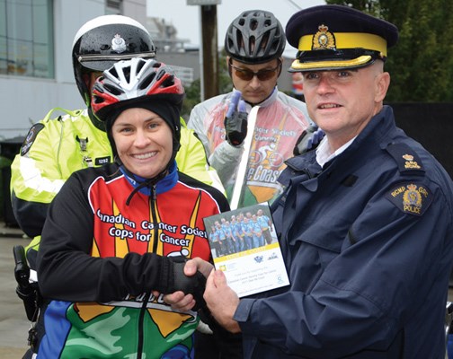 North Vancouver RCMP Const. Julia Ash and Insp. Chris Kennedy attend.