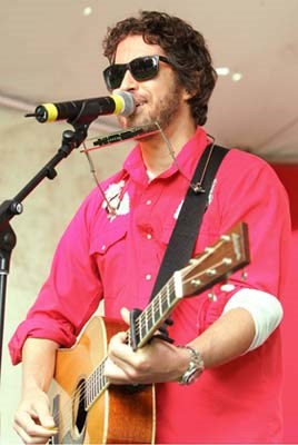Adam Woodall performed solo at the Canada Day festival in John Lawson Park on Sunday.