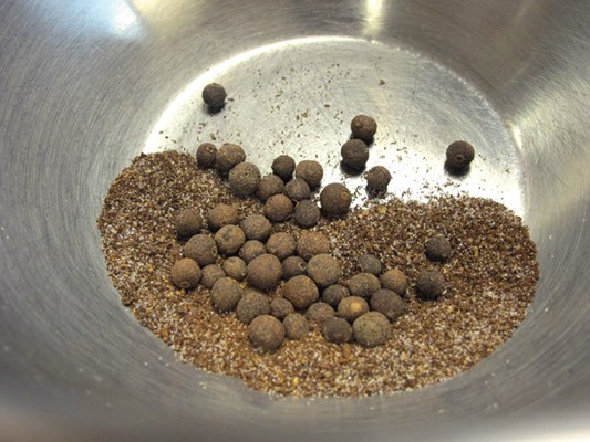 Allspice is tossed into the mix before toasting and grinding.