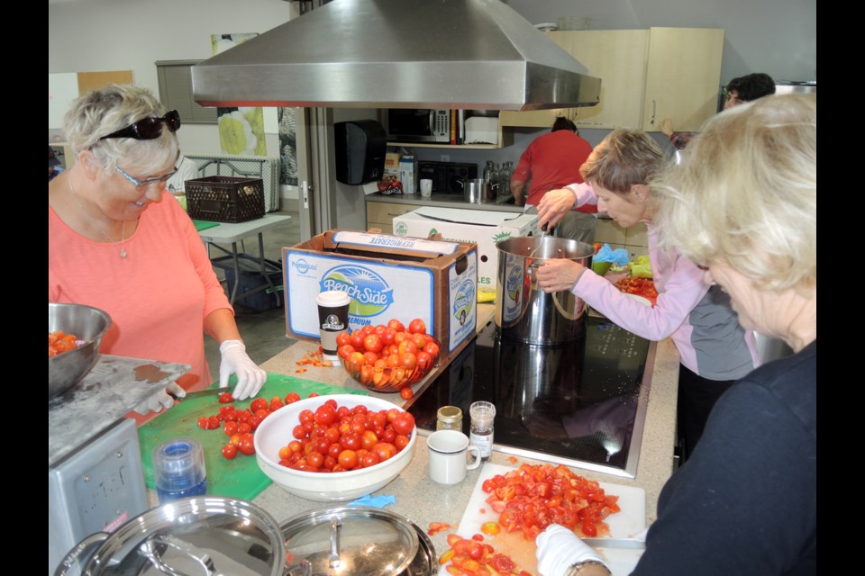 Tomatoes picked from the Sharing Farm are turned into a fresh, homemade salsa, which the farm sells.