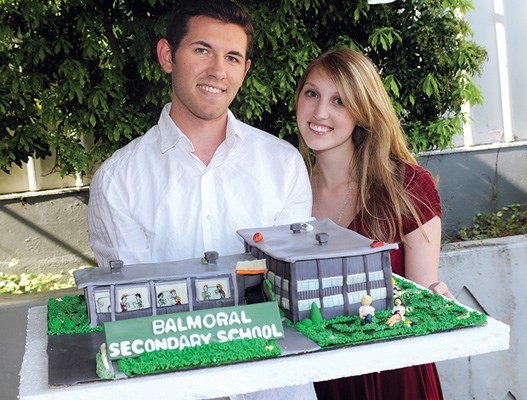 Aaron Boyd helps out Balmoral cake creator Angelica Barber.