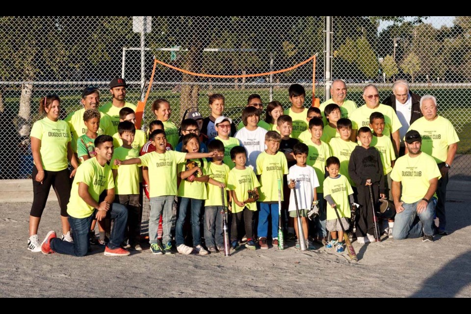 Participants in the Just Play Ball program, run out of east Richmond’s King George Park by the volunteer-driven Dugout Club, pose for a photo during their wrap-up party last month. The free program — designed to introuduce young kids to baseball — launched in the spring and ran right through to September, atttacting more than 100 children from east Richmond neighbourhoods, many of whom wouldn’t normally play sports, for various reasons.