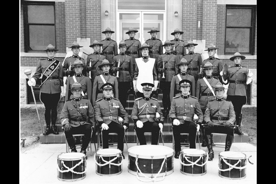 The Depot Division drum and bugle band, Regina, circa 1961. The author is in the top row, far right. Terry David Mulligan, later a well-known TV and radio personality, is in the third row, third from the right, and Jim Treliving, founder and owner of Boston Pizza, is the drum major standing on the far left.