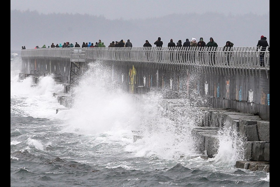 Waves hit the breakwater at Ogden Point on Saturday, Oct. 15, 2016. The third and strongest in a series of storms were expected to hit the South Coast on Saturday evening.