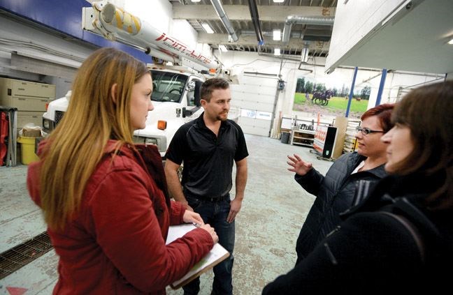 Kickoff of the BizRide Program at Trim Line Graphics and Signs Tuesday afternoon. Left to right Laura Lawrence, Chamber of Commerace, Nolan Nicholson, owner of Trim Line, Cindi Pohl president of the Chamber of Commerace and Kathleen Soltis, city manager. The BizRide is aimed at enhancing the relationship between the City of Prince George, the Chamber of Commerce, and other community leaders with the local business community and is an opportunity for business persons to share information directly with decision makers about operating in Prince George. Citizen photo by Brent Braaten   Oct 18 2016