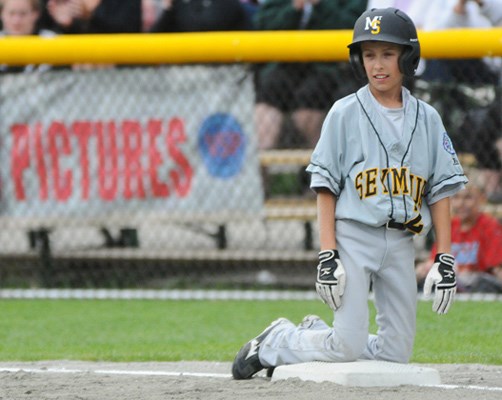 National Championship Little League host team Mount Seymour (grey) played against Sydney Mines (black) from Sydney, Nova Scotia representing Atlantic Canada for the 6pm game Wednesday August 10th.