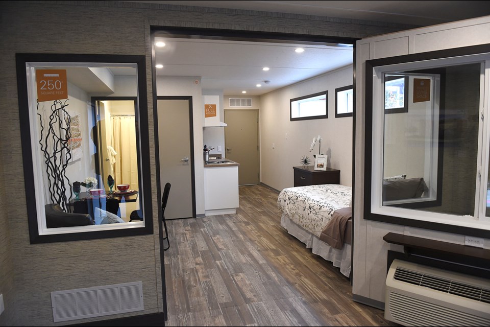 A model suite for the city’s first temporary modular housing pilot project was unveiled Monday. photo Dan Toulgoet