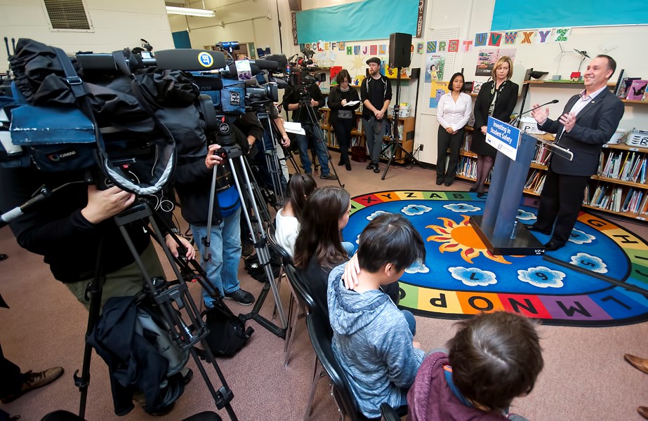 PAC chair Tam Cummings, the VSB's official trustee Dianne Turner and education minister Mike Bernier at a Tennyson elementary school press conference Thursday morning. Photo Chung Chow