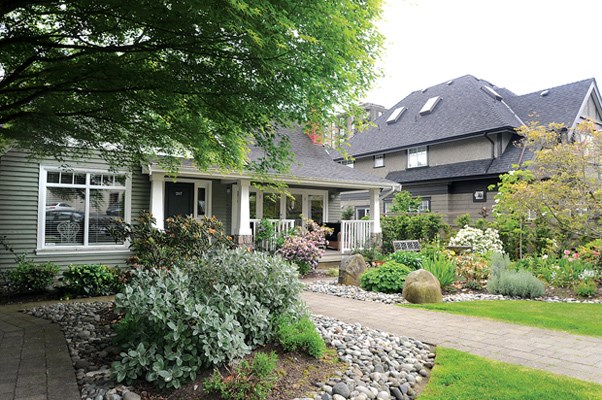 Different types of housing density on the corner of St. Georges Avenue and Eighth Street in the City of North Vancouver feature townhouses along St. Georges (on right) and two infill homes behind on Eighth.Different types of housing density on the corner of St. Georges Avenue and Eighth Street in the City of North Vancouver feature townhouses along St. Georges (on right) and two infill homes behind on Eighth.