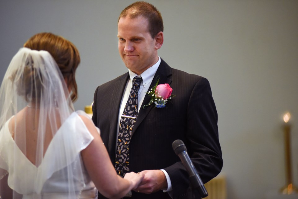 Iona and Kelly Matiowsky said their vows during Saturday’s mass wedding ceremony at St. Mary’s Paris