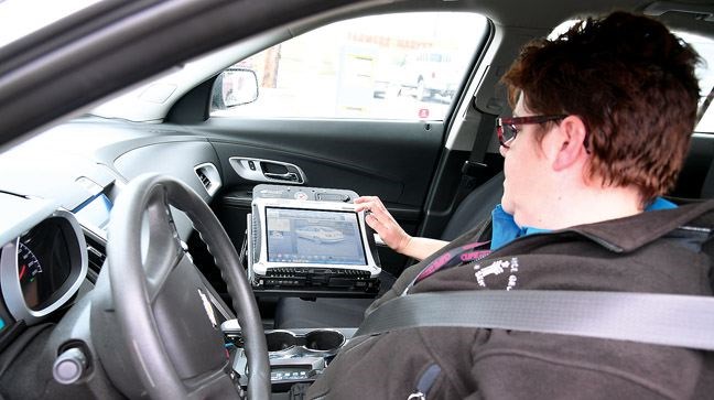 Tracy Koop, a parking control officer, demonstrates the computer used for the Licence Plate Recognition to monitor parking in the downtown. Citizen photo by Brent Braaten   Nov 3 2016