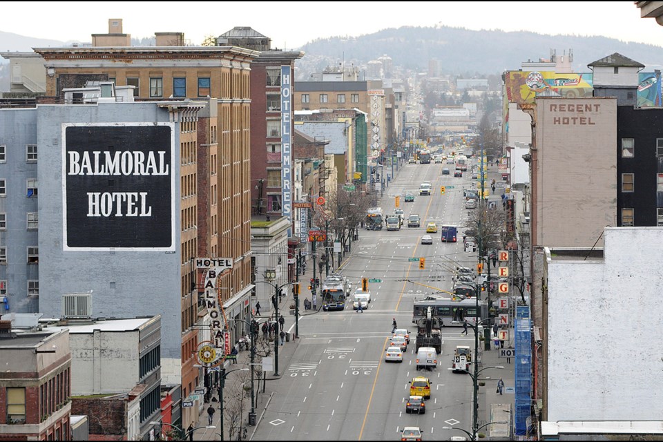 The Balmoral and Regent hotels, located in 100 block of East Hastings, top the city's list of single-room-occupancy hotels in the Downtown Eastside that continue to contravene bylaws. The hotels are owned by the Sahota family. Photo Dan Toulgoet