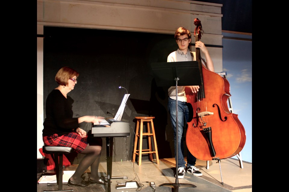 Musical director Julie Atchison with bass player Parker Elkins, a Grade 12 NWSS student, in rehearsal for Forever Plaid.