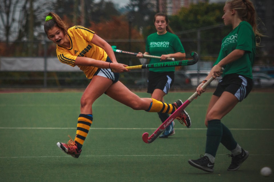 Collingwood co-captain Madison Connell takes a swing during the North Shore AA final earlier this season. Two North Shore teams hit the podium at the AA field hockey provincial championships last week, with the Cavaliers claiming silver and Seycove earning bronze. photo by Ryan Neale/Collingwood School