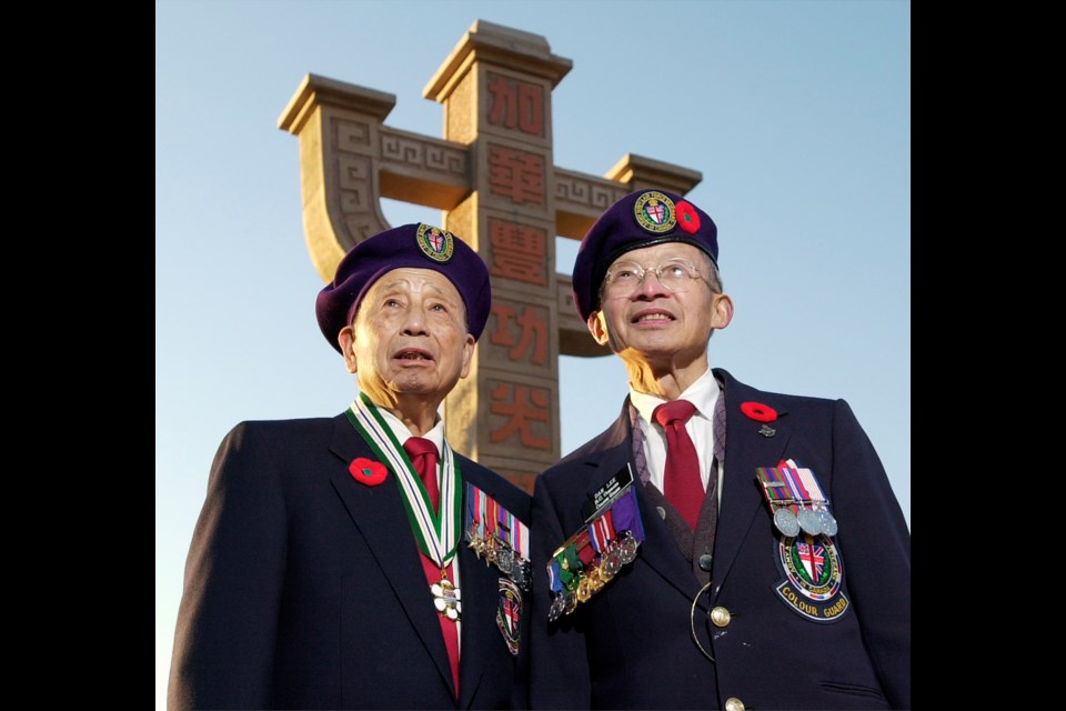 Veterans Roy Mah and Daniel Lee photographed at Chinatown Memorial Square in November 2003. Both Canadian-born men, who served in the Canadian Forces before being granted citizenship, have since died. Photo Dan Toulgoet
