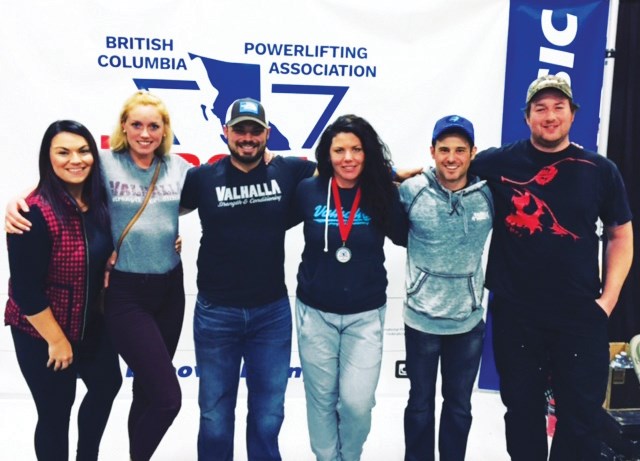 Erin Clark at the BC Powerlifting Fall Classic in Abbotsford with her friends and supporters. From left to right: Courtney Munson, Orianna Gray, Curtis Munson, Clark, Pete Williams and Lewis Robinson.