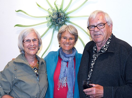 Carole, Suzan and Dennis Badgley enjoy the gallery opening.