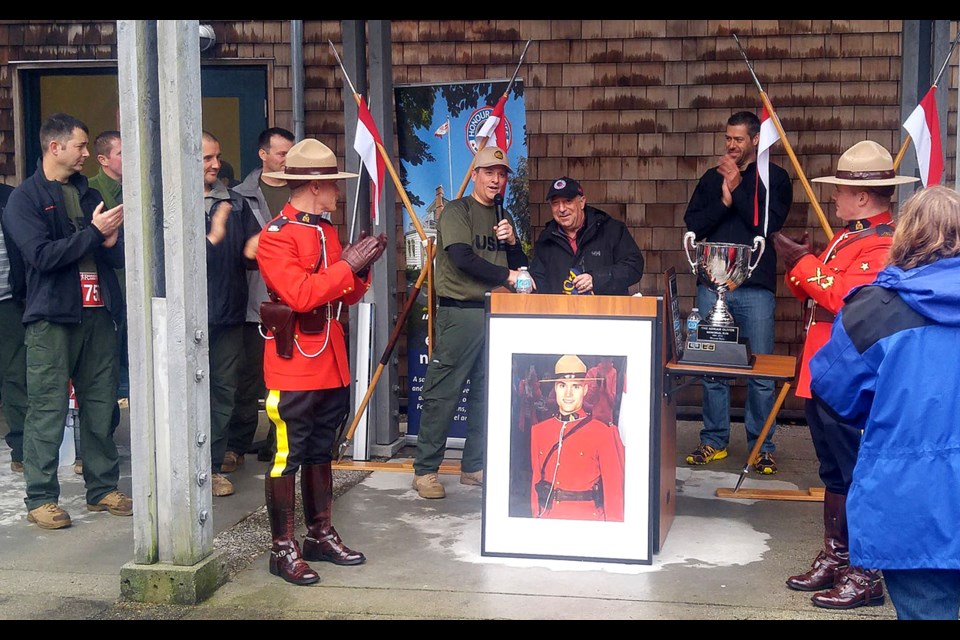 Honour House executive director Honorary Lt. Col. Allan De Genova, centre, at the 2016 Adrian Oliver Memorial Run on Saturday at Deer Lake Park.