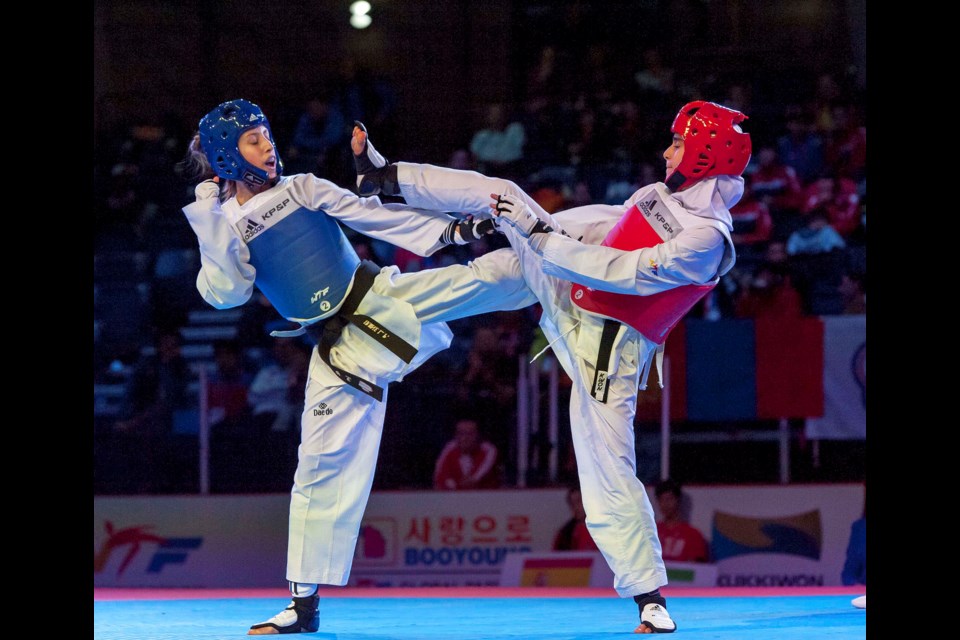 In a tough final on the opening day of the World Taekwondo junior championships in Burnaby, Spain's Irene Laguna Perez and Iran's Mobina Nejad Katesari battled in the female 42kg class. Kaesari took the gold medal with an 8-0 win.