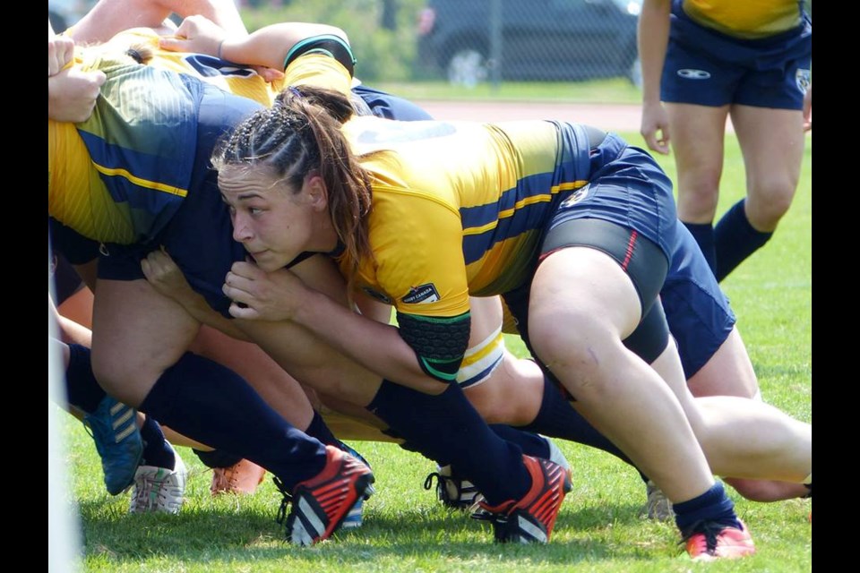 Simon Fraser University rugby player Demi Stamatakis, at right, is among the Canadians who are playing in a three-game tour of the United Kingdom this week, facing Ireland, New Zealand and England.