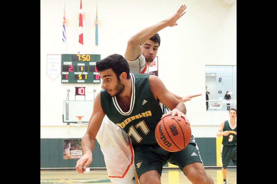 UNBC ball carrier Vaggelis Loukas plots his next move during first-half action Saturday against the Thompson Rivers University WolfPack at the Northern Sport Centre.