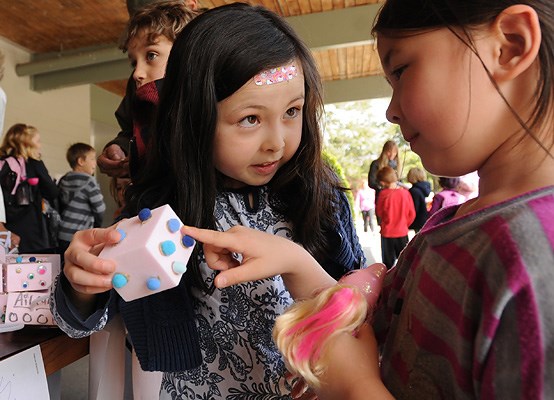 Grade 3 students from Queen Elizabeth annex raised roughly $500 over two weeks by holding several markets. Their wares ranged from food and home-made jewelry to scarves and cards. The cash is earmarked for B.C. Children's Hospital's ChildRun. Isabel Geiger and her friend do some shopping.