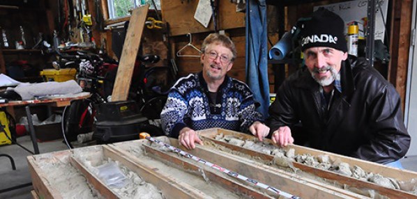 SFU scientists Brent Ward (left) and Lionel Jackson check out some of the drill core samples they we