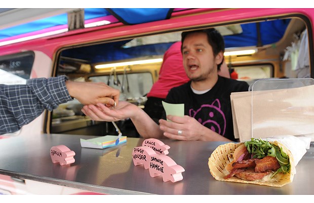 Pig on the street's Mark Cothey serves up the pork.