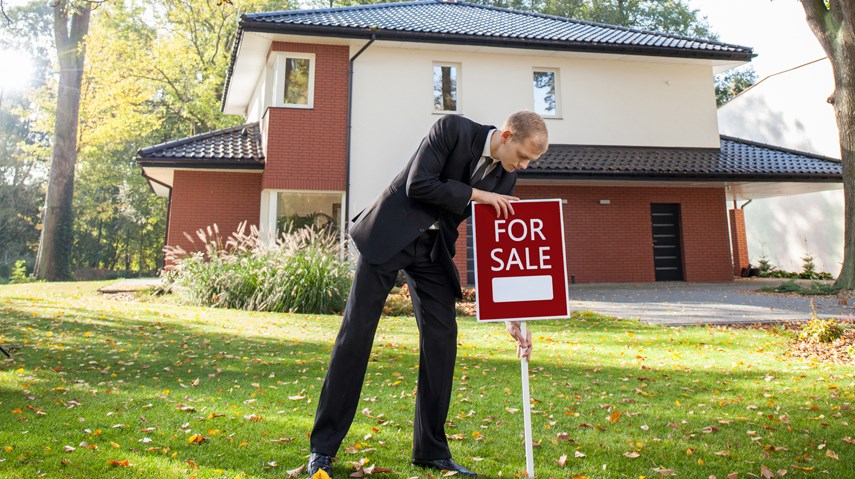 House for sale sign fall