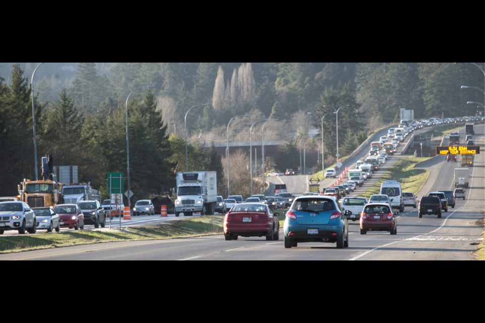 Traffic is backed up on the Trans Canada Highway near West Burnside Road on Friday morning because of a watermain break. Dec. 16, 2016.