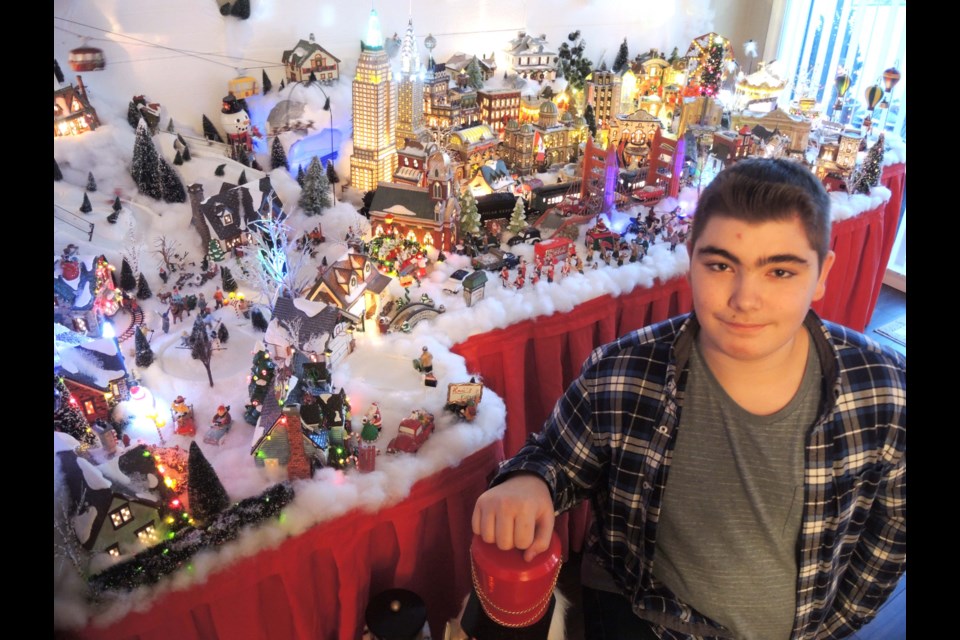 McMath secondary Grade 11 student Kai Costerd isn’t your average 16-year-old. He’s been collecting Christmas village scenes since he was 10 and spends a month setting his display in his Steveston living room, which, along with other Christmas decorations, comes to life at the flick of a switch, Below, Kai’s drive-in movie theatre and fairground.
