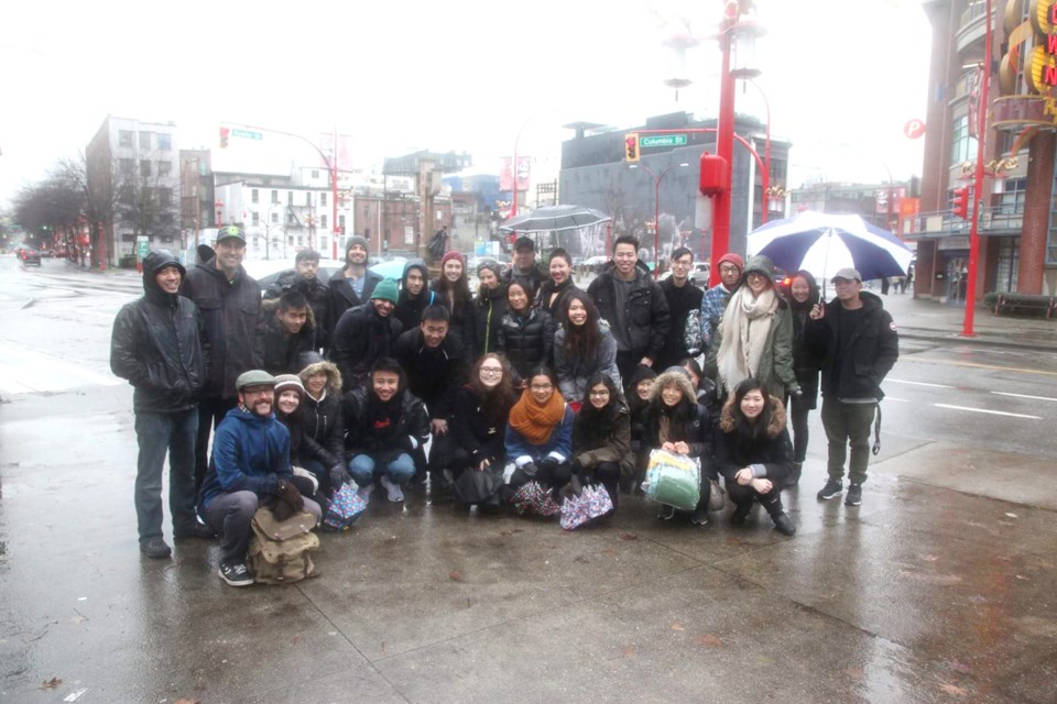 Members of the Ignite The Warmth team and volunteers arrive on the Downtown Eastside with their packages for the area’s residents.