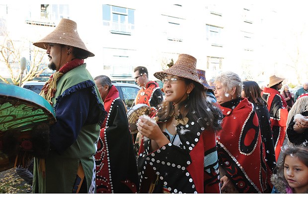 The Aboriginal Mother Centre marked its official opening Friday with the raising of a totem pole at the centre's location at 2019 Dundas St.