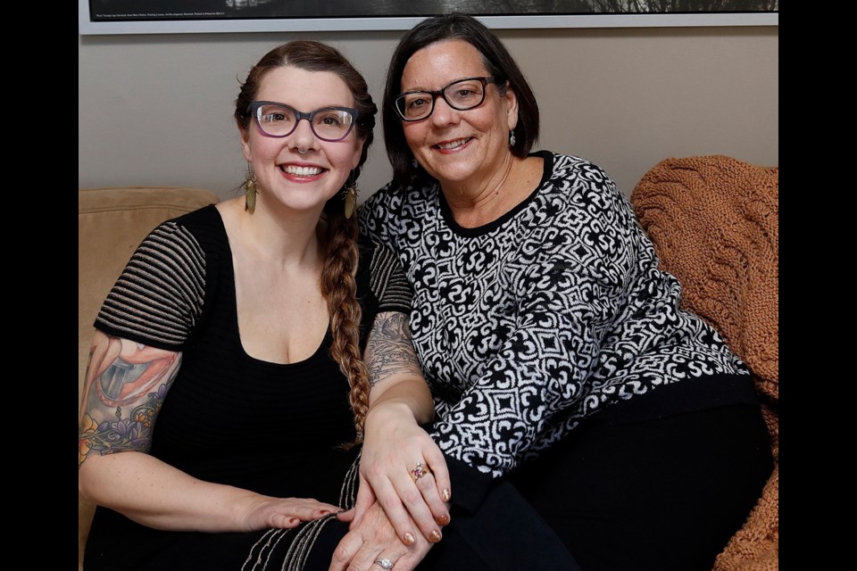 Susan Carrigan upgraded her wedding ring for her 25th anniversary and passed on her original ring to be used in the design of her daughter Molly's wedding ring.