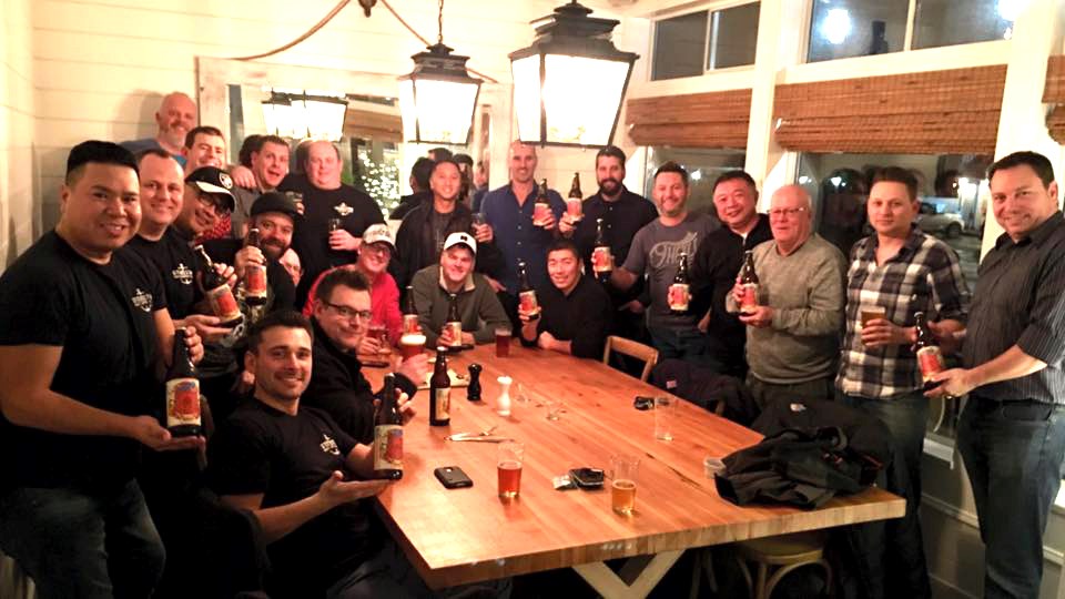 A few members of the 400-strong Steveston Men’s Support Group (SMSG) toast their personalized beer, a blonde ale created specially by new local, craft brewers Britannia Brewing. Net proceeds from the sale of the beer, of which only a very limited amount was released, was handed to local charities.