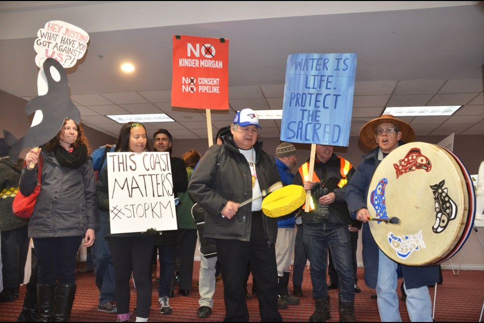 After two hours of rallying outside Wednesday, Kinder Morgan protesters made their way upstairs to the Trans Mountain open house inside Coquitlam’s Executive Plaza Hotel and Conference Centre.