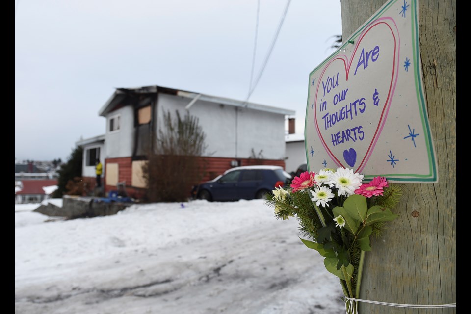 Fire broke out Thursday afternoon in a bedroom at this house at East 15th Avenue and Nootka Street. The fire claimed the life of a two-and-a-half-year-old child. Photo Dan Toulgoet