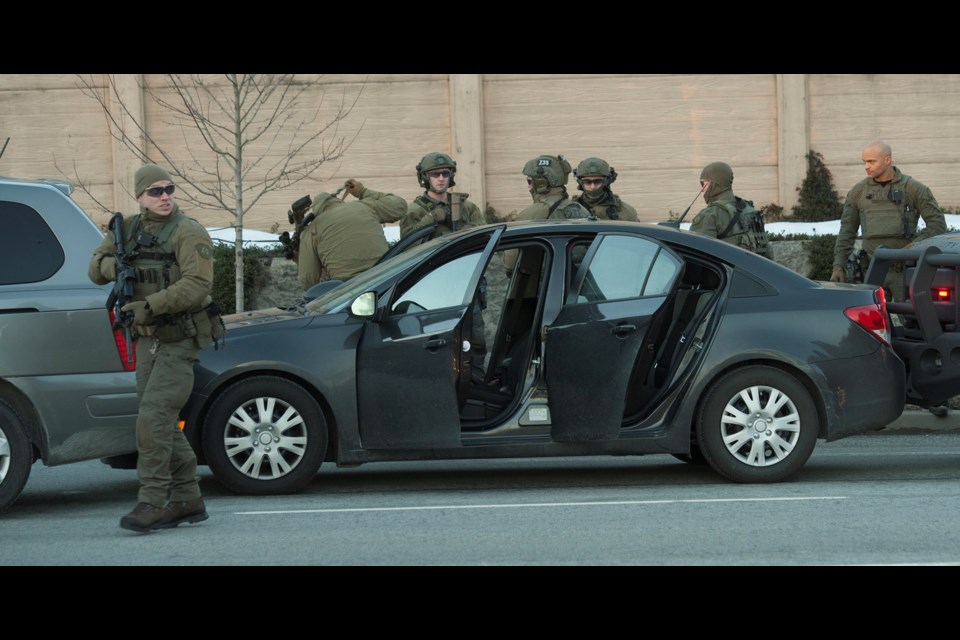 Police at a high-risk take down in Coquitlam today, Tuesday.